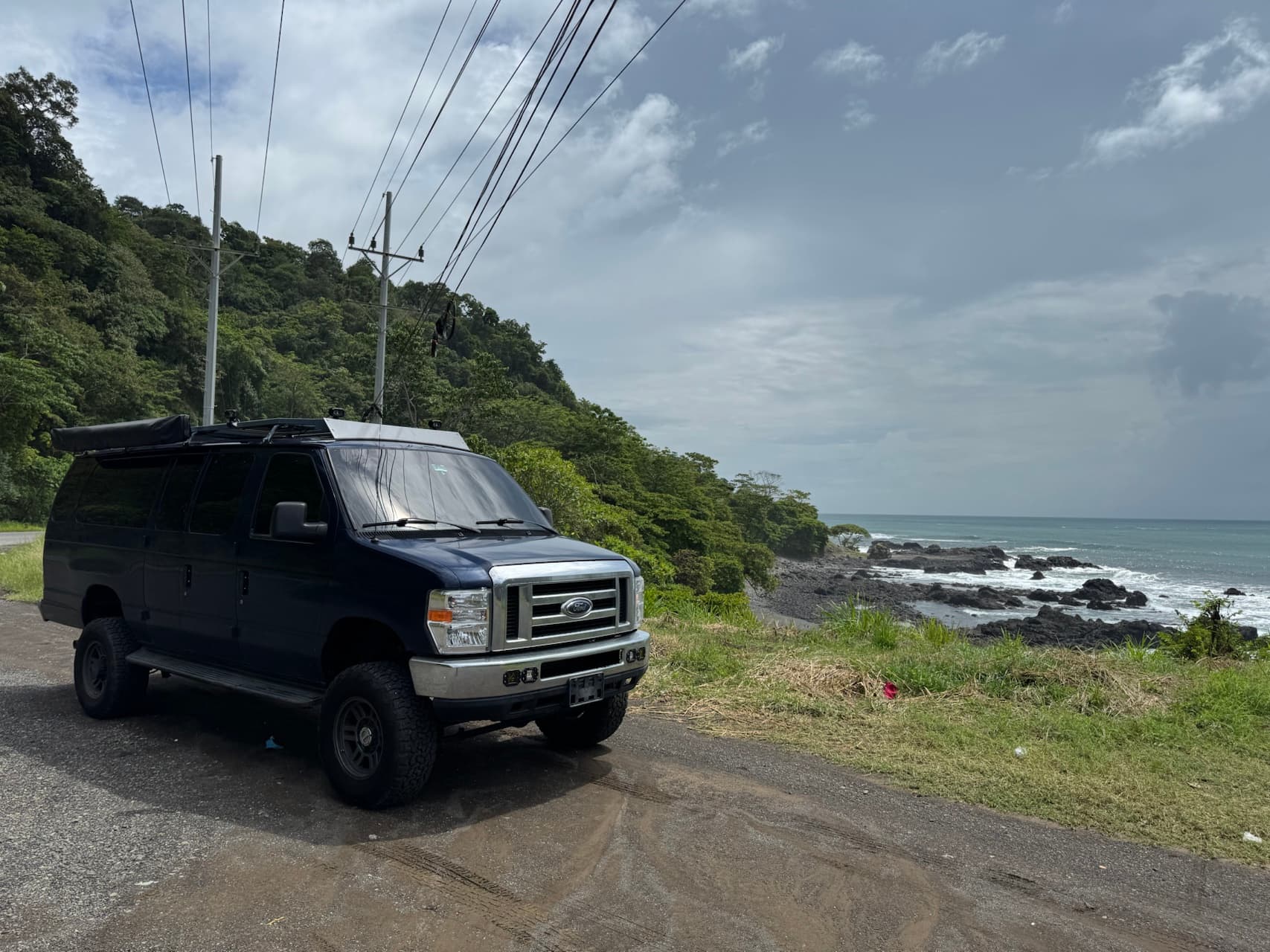 Adventure vehicle on coastal road